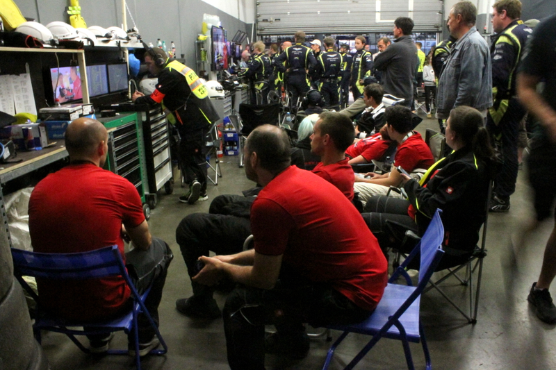 One of the more standard garage setups: a few monitors and toolboxes per team.
